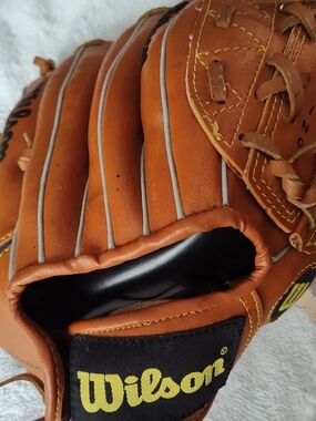 Wilson Youth Glove Size 10 1/2. For the left hand, for a right handed thrower.